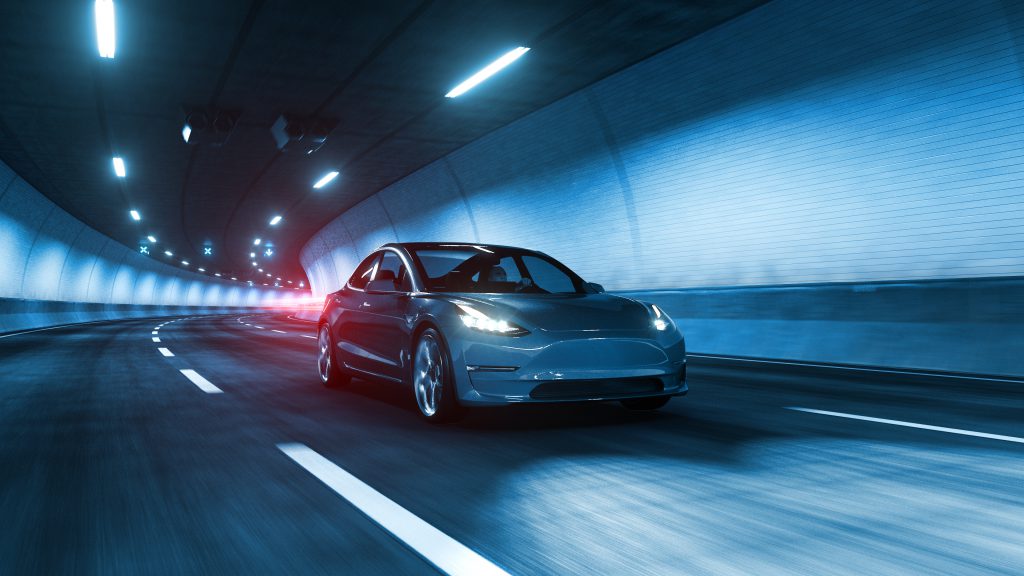 Modern,Electric,Car,Rides,Trough,Tunnel,With,Cold,Blue,Light